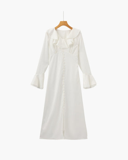 Vestido midi con volantes y botones de perla