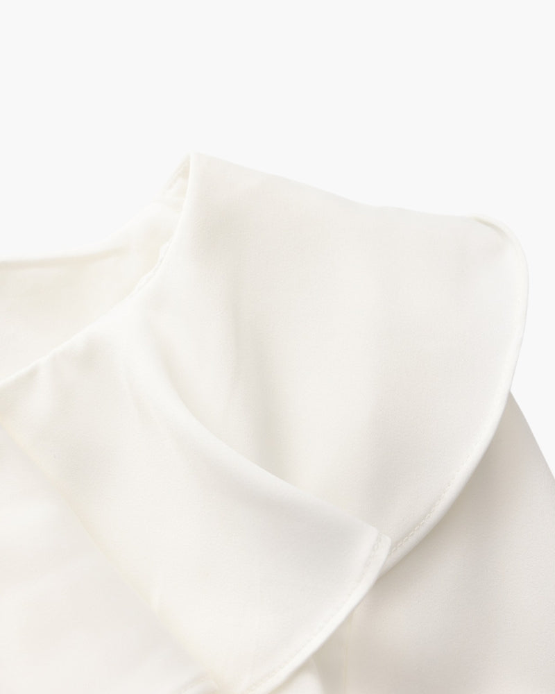 Vestido midi con volantes y botones de perla