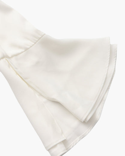 Vestido midi con volantes y botones de perla