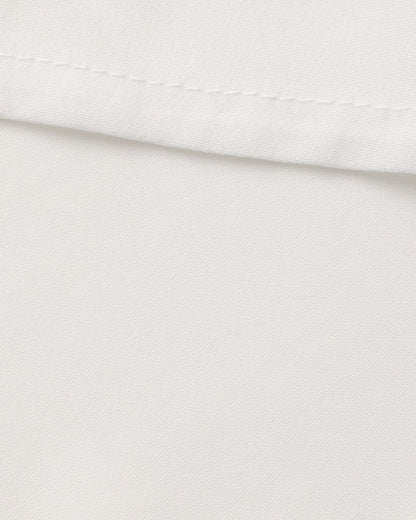 Vestido midi con volantes y botones de perla